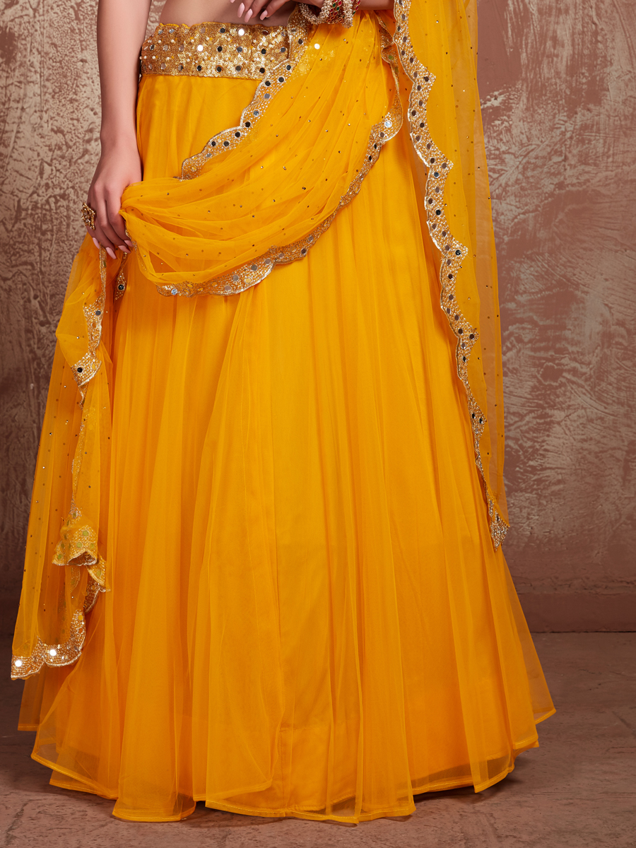 Amber Yellow Soft Net Embroidered Party Lehenga Choli