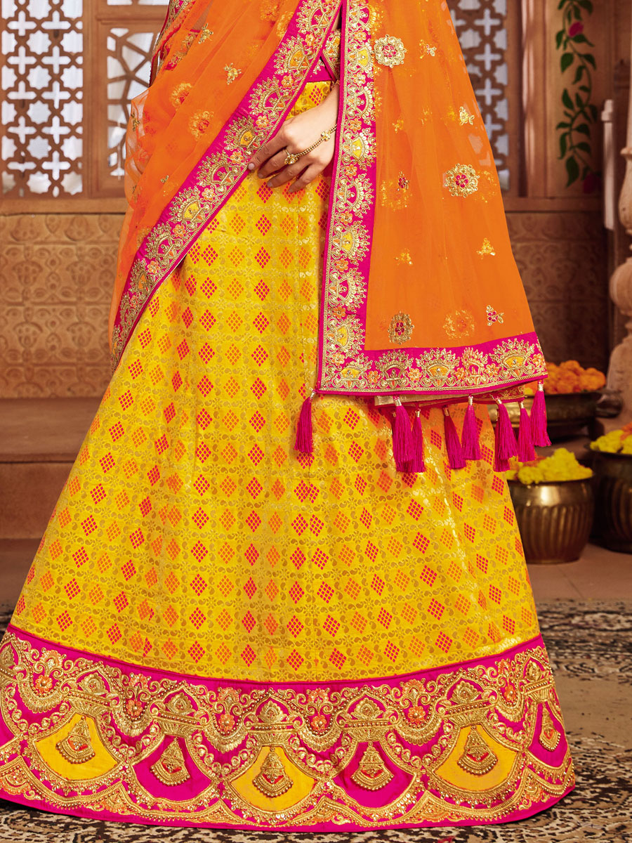 Golden Yellow Patola Silk Party Embroidered Lehenga Choli