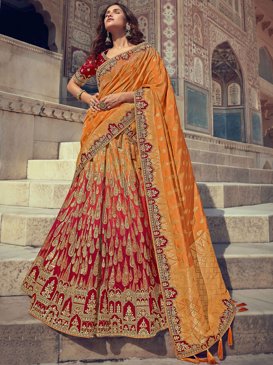 Gamboge Orange And Red Silk Party Embroidered Lehenga Choli