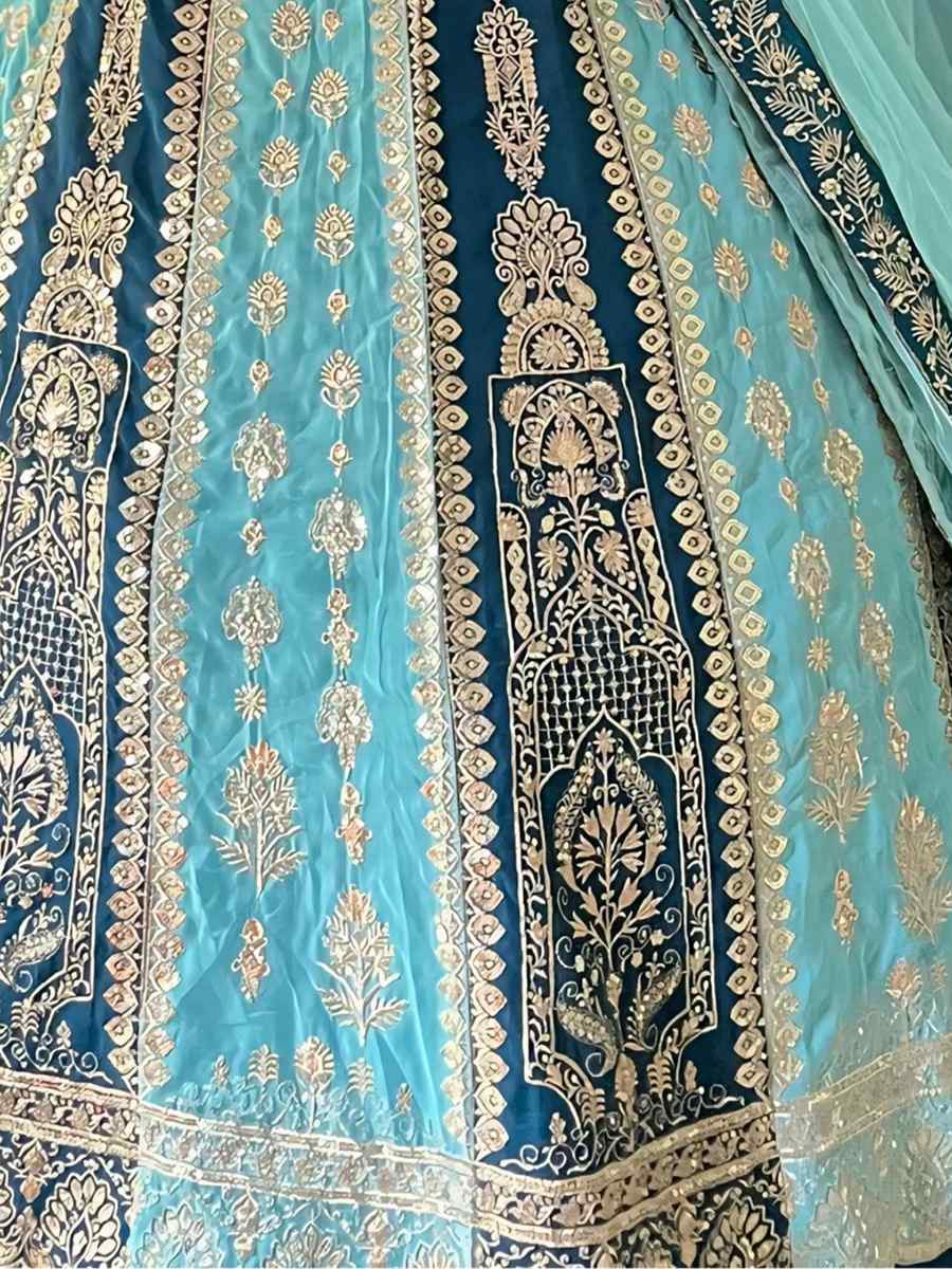Aqua Blue Faux Georgette Embroidered Wedding Festival Heavy Border Lehenga Choli