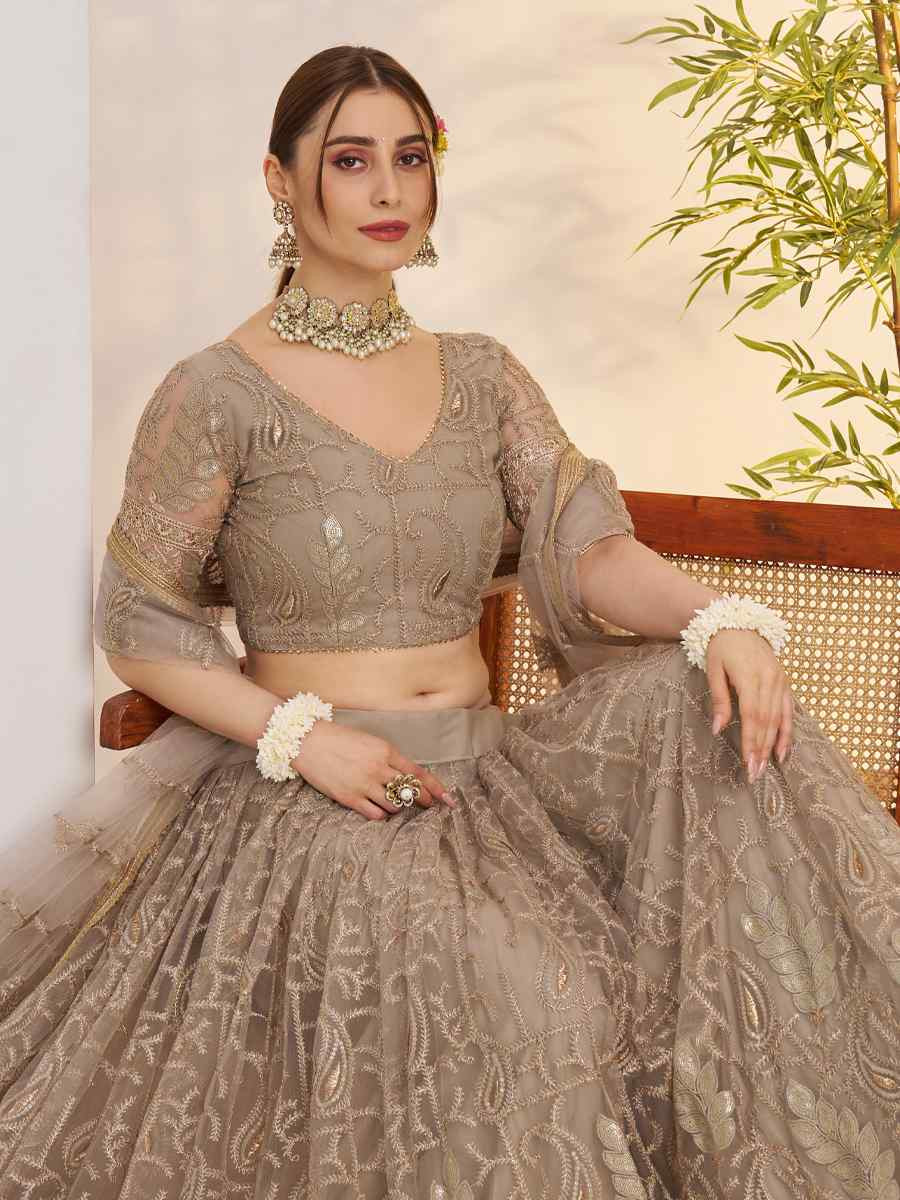 Beige Butterfly Net Embroidered Bridal Wedding Reception Festival Heavy Border Lehenga Choli