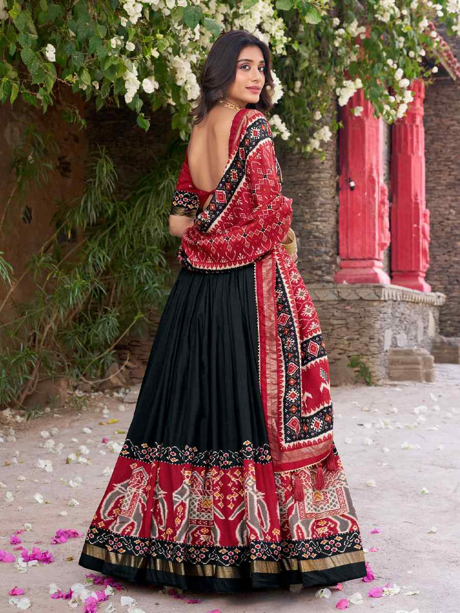 Black Tussar Silk Printed And Hand Embroidered Party Reception Wedding Lehenga Choli