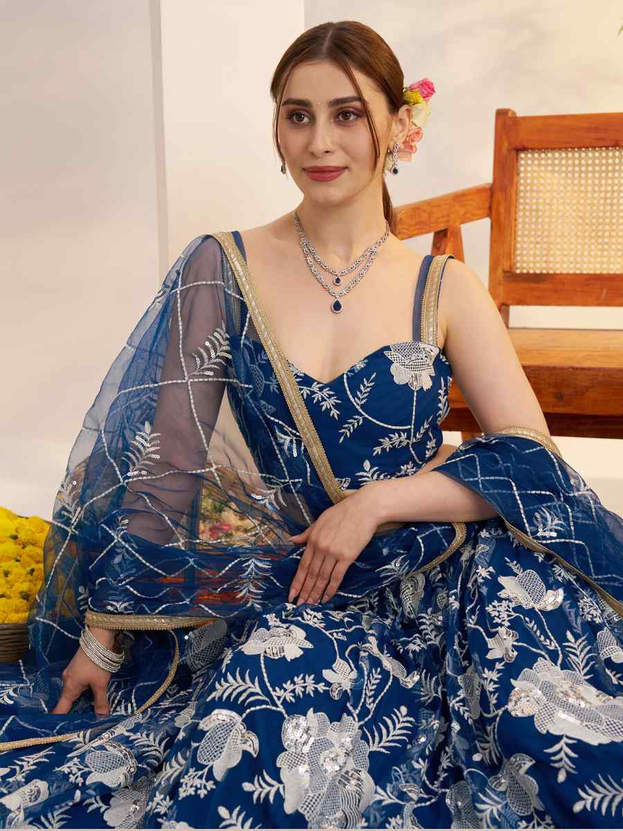 Blue Butterfly Net Embroidered Bridal Wedding Reception Festival Heavy Border Lehenga Choli