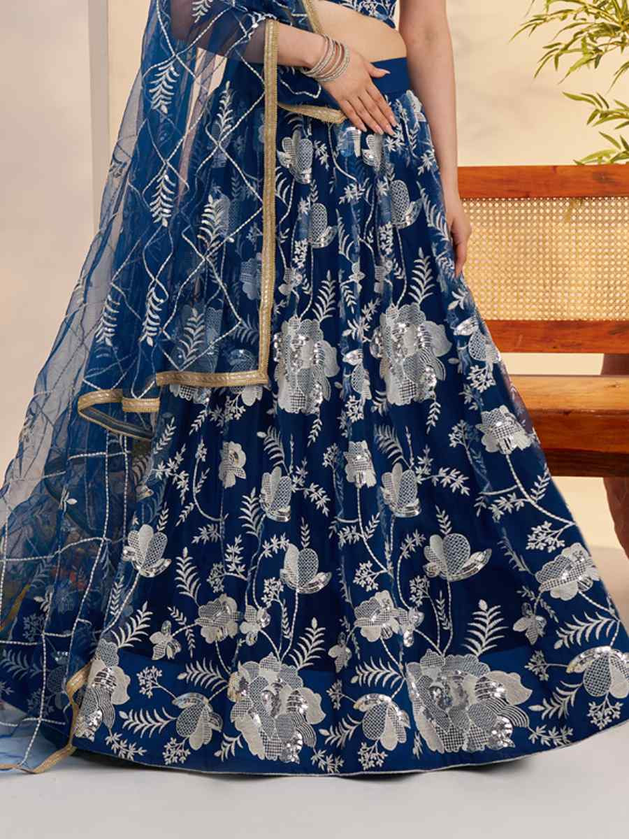 Blue Butterfly Net Embroidered Bridal Wedding Reception Festival Heavy Border Lehenga Choli