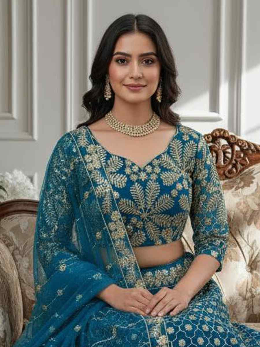 Blue Butterfly Net Embroidered Bridal Wedding Reception Festival Heavy Border Lehenga Choli