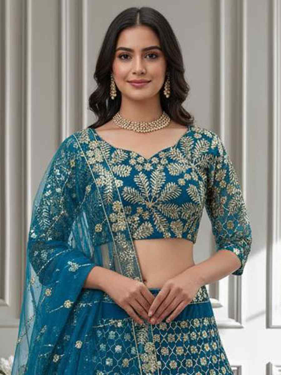 Blue Butterfly Net Embroidered Bridal Wedding Reception Festival Heavy Border Lehenga Choli