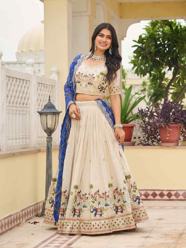 Image of Cream Pure Tissue Silk  Embroidered Wedding Reception Festival Heavy Border Lehenga Choli