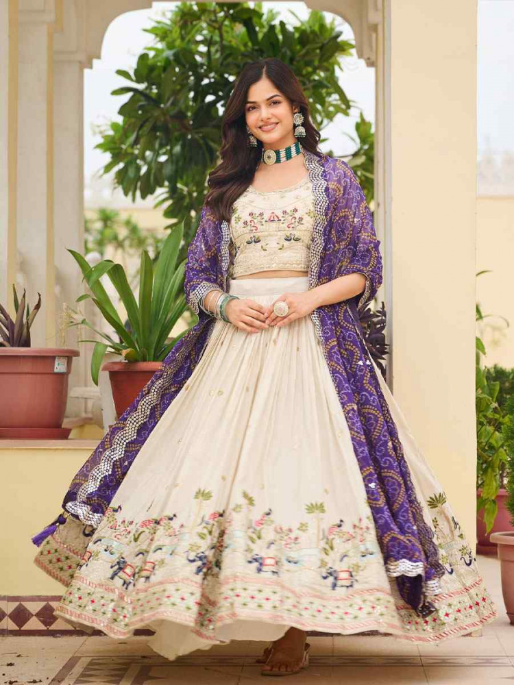 Image of Cream Pure Tissue Silk  Embroidered Wedding Reception Festival Heavy Border Lehenga Choli