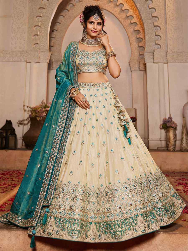 Cream Tissue Embroidered Reception Wedding Heavy Border Lehenga Choli