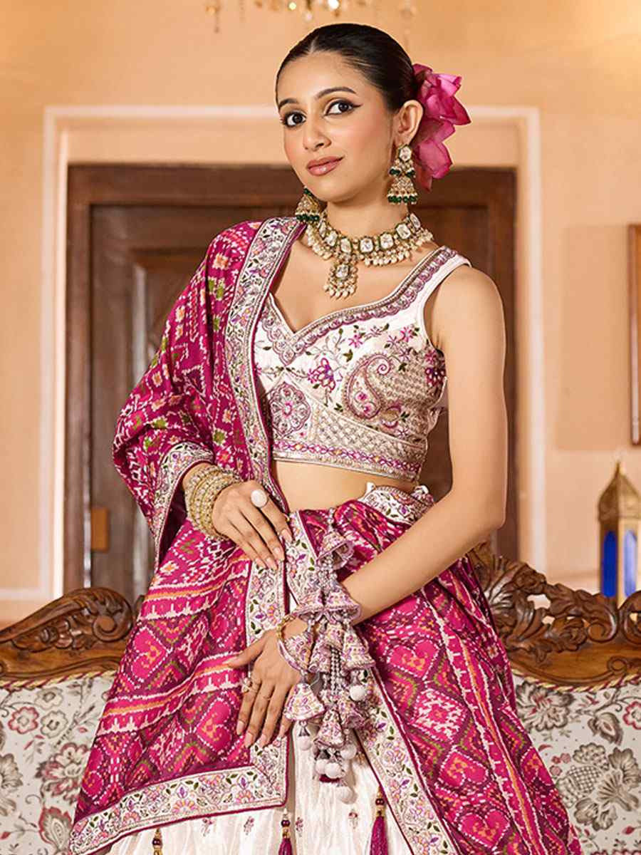 Cream Tissue Embroidered Wedding Reception Festival Heavy Border Lehenga Choli