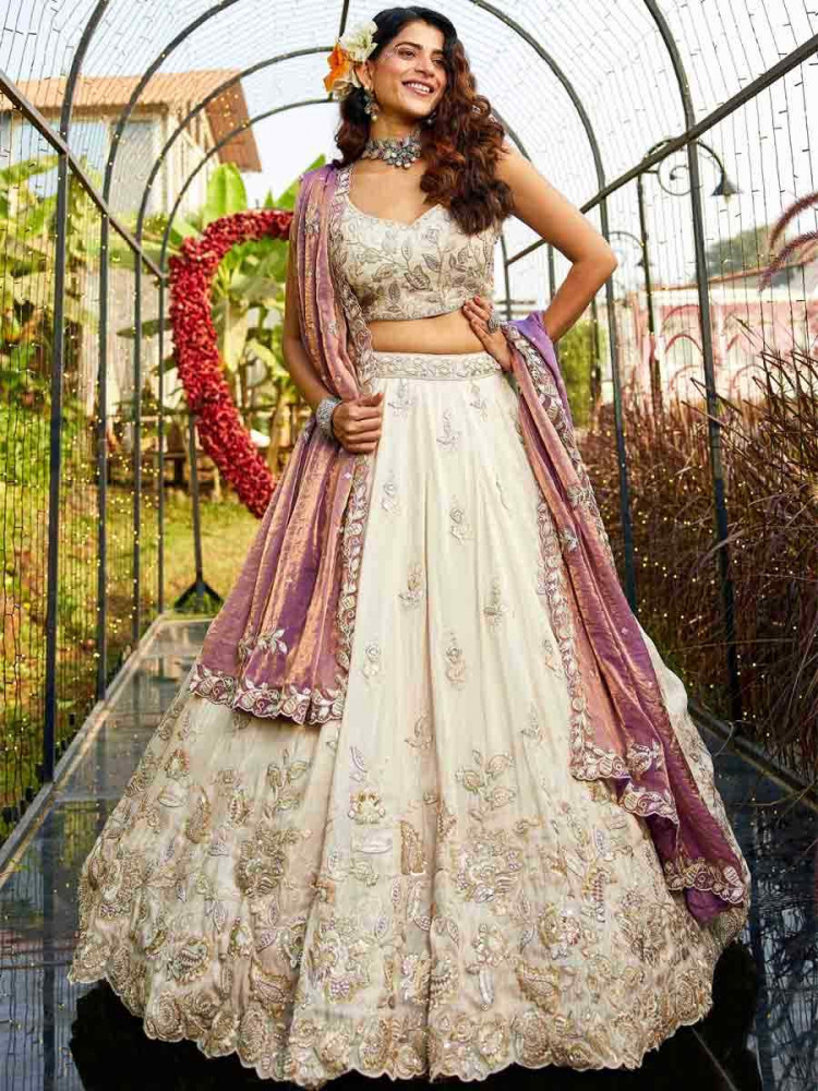 Image of Cream Tissue Embroidery Reception Party Wear Heavy Border Lehenga Choli