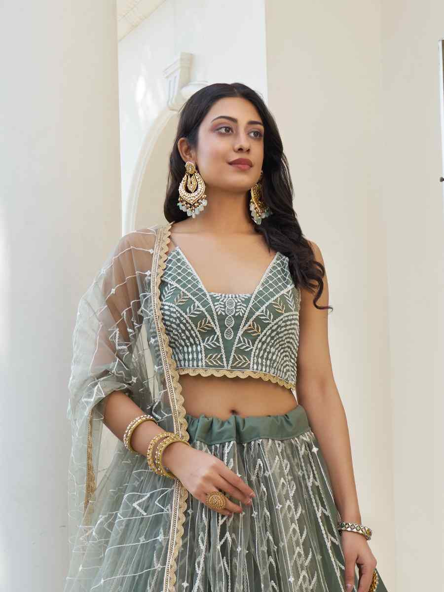 Dusty Green Net Embroidered Wedding Reception Festival Heavy Border Lehenga Choli