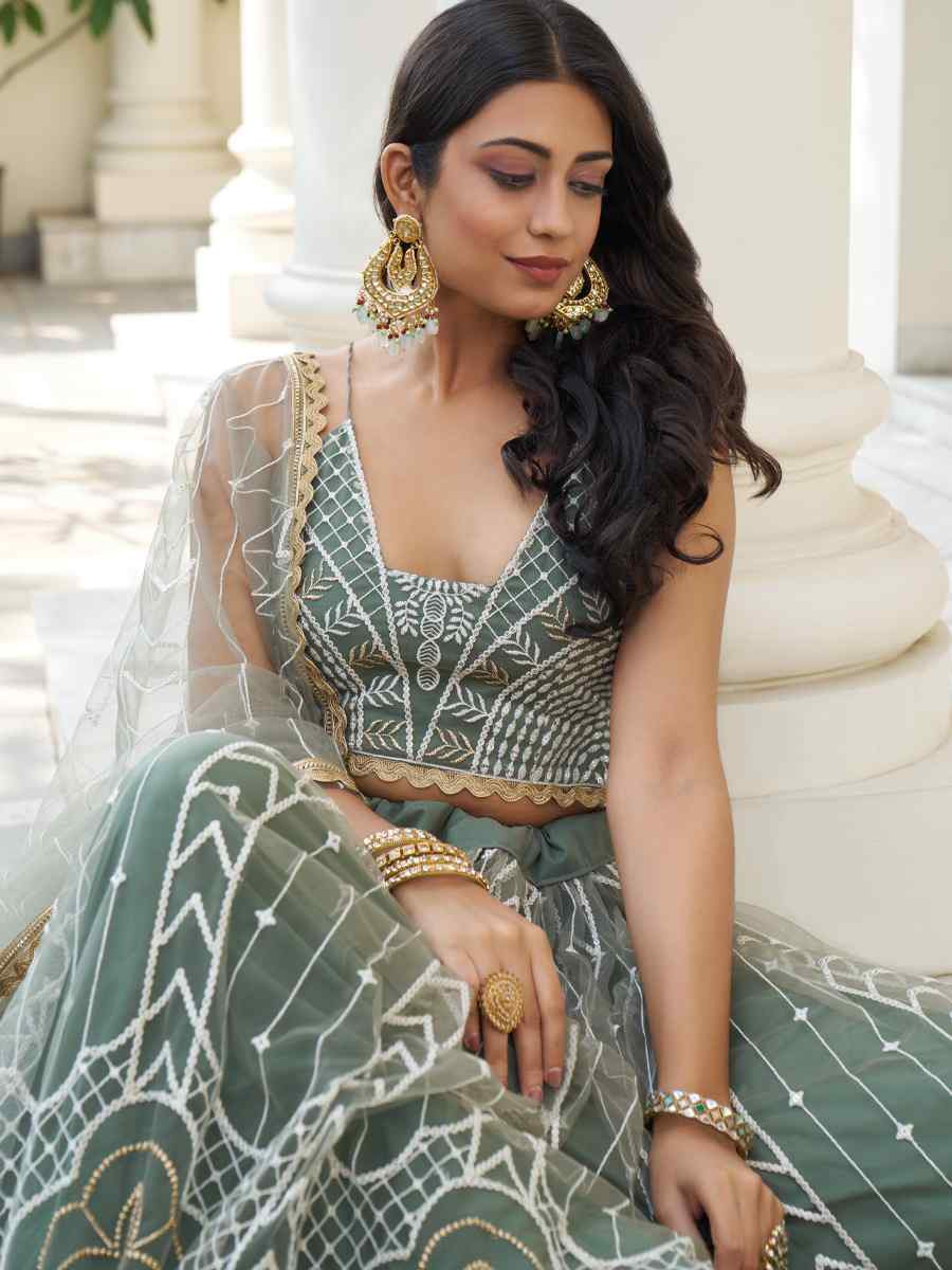 Dusty Green Net Embroidered Wedding Reception Festival Heavy Border Lehenga Choli