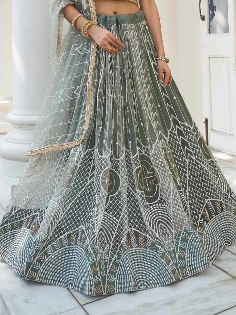 Dusty Green Net Embroidered Wedding Reception Festival Heavy Border Lehenga Choli