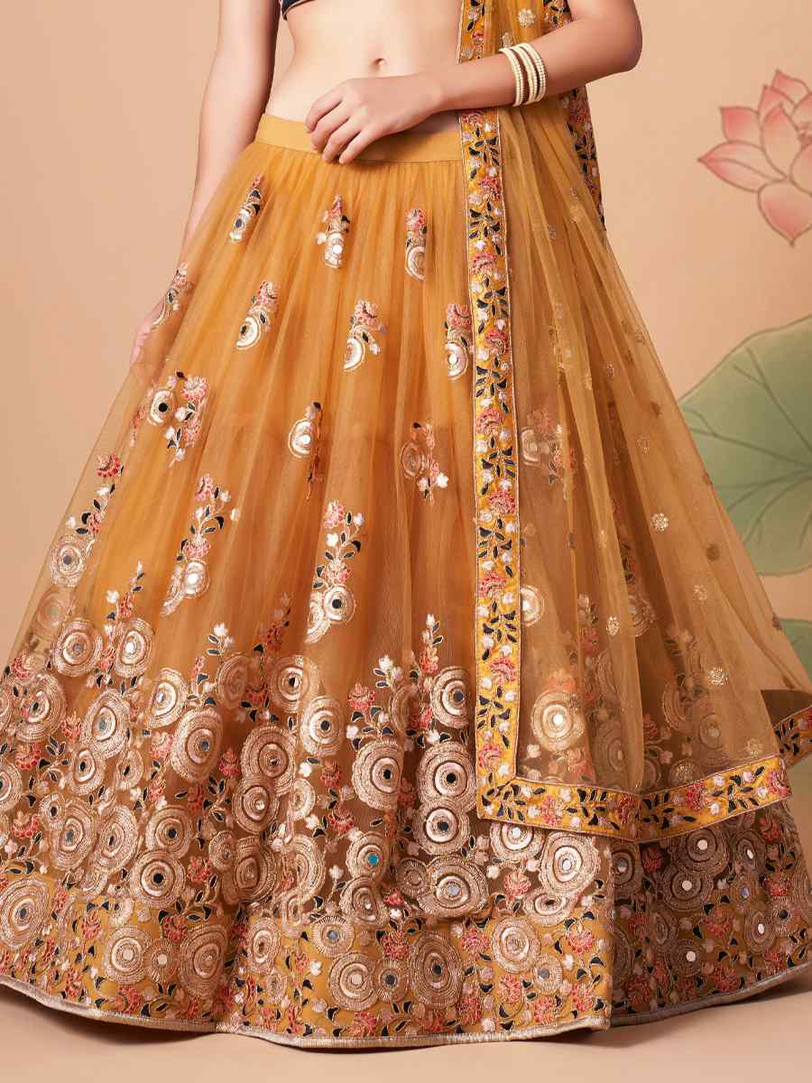 Golden Soft Net Embroidered Reception Festival Heavy Border Lehenga Choli