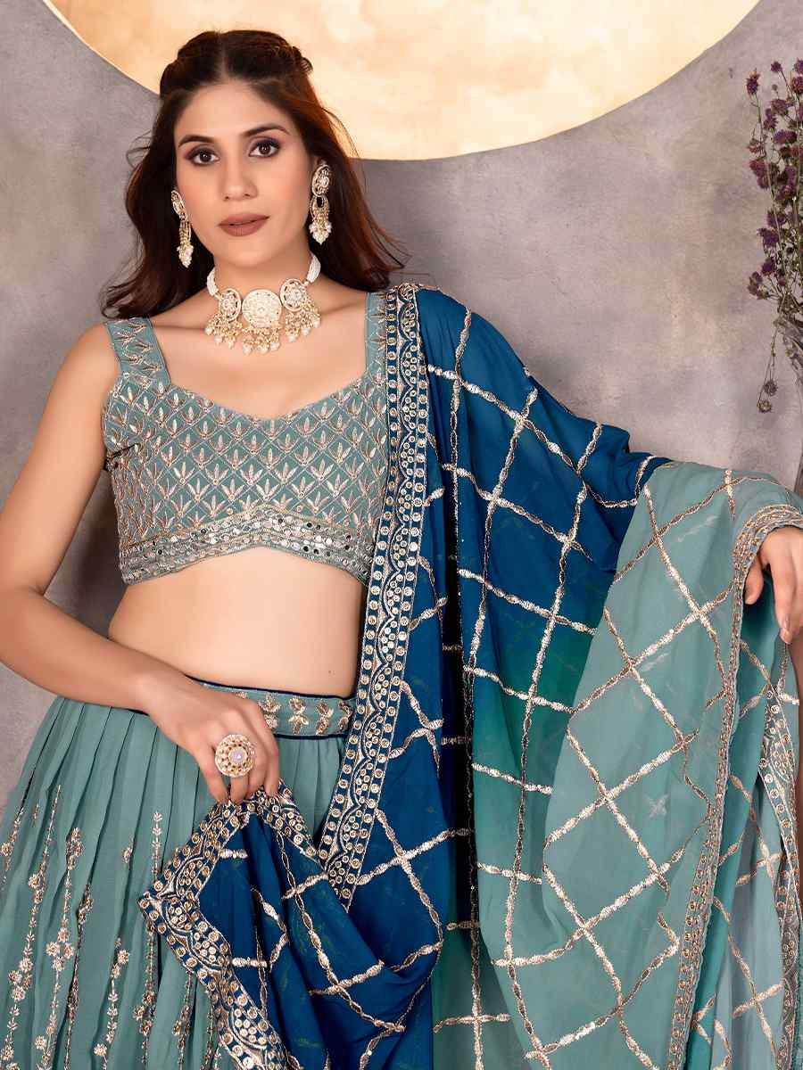 Green Faux Georgette Embroidered Wedding Festival Heavy Border Lehenga Choli