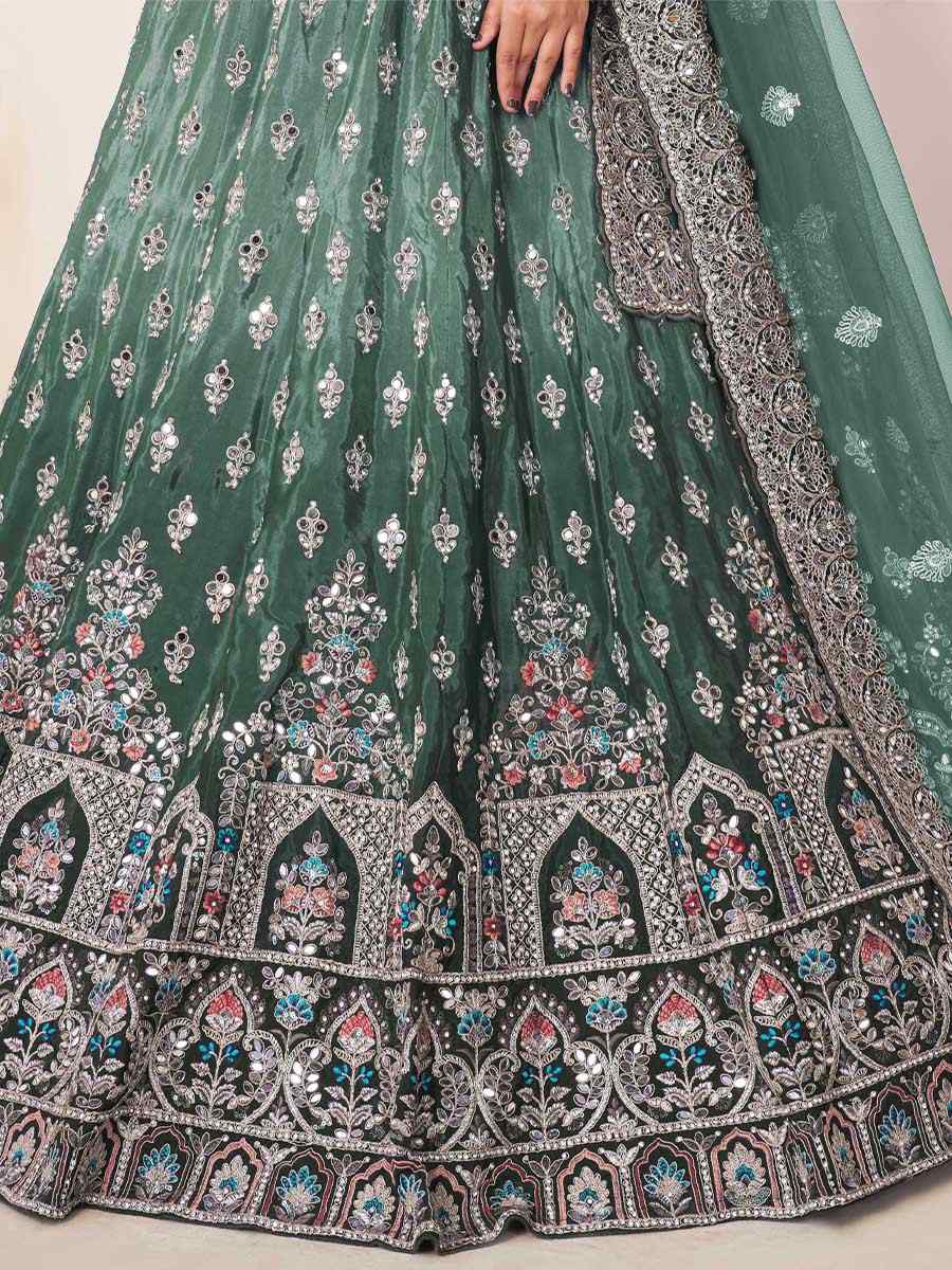 Green Net Embroidered Reception Wedding Heavy Border Lehenga Choli