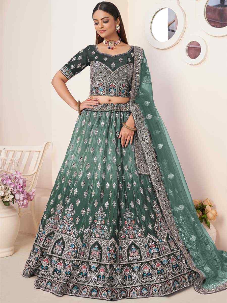 Green Net Embroidered Reception Wedding Heavy Border Lehenga Choli