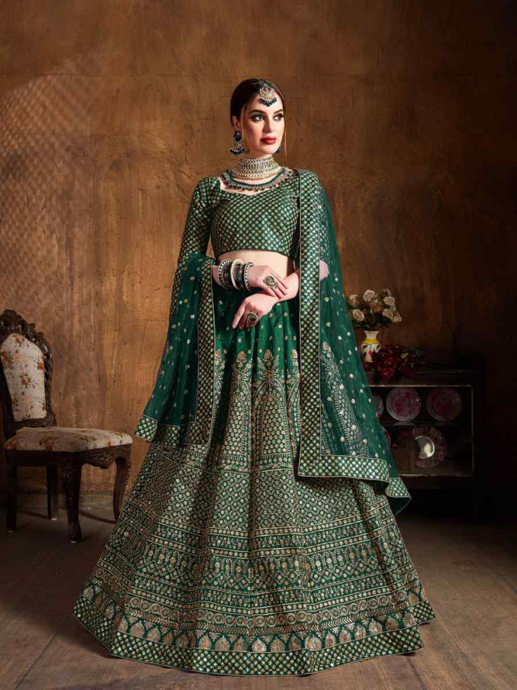 Image of Green Raw Silk Embroidered Wedding Reception Festival Heavy Border Lehenga Choli