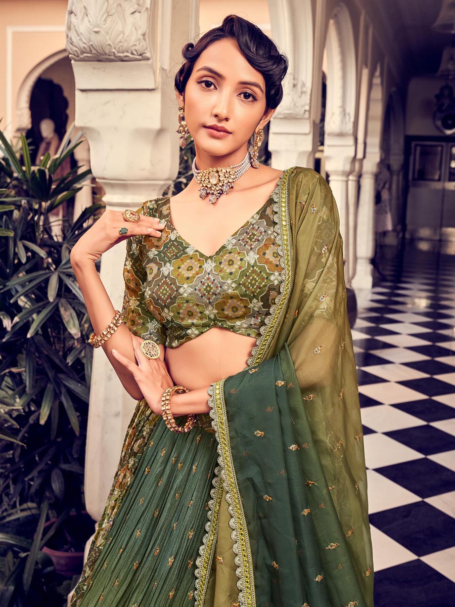 Green Silk Embroidered Bridesmaid Wedding Heavy Border Lehenga Choli