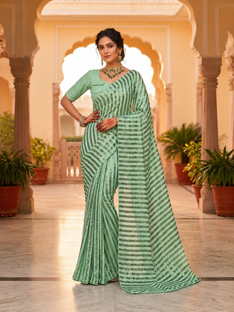 Image of Green Silk Sequins Wedding Reception Party Festival Casual Heavy Border Sarees