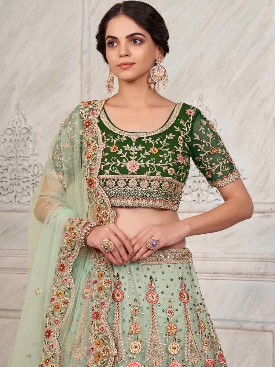 Green Soft Net Embroidered Bridal Reception Heavy Border Lehenga Choli