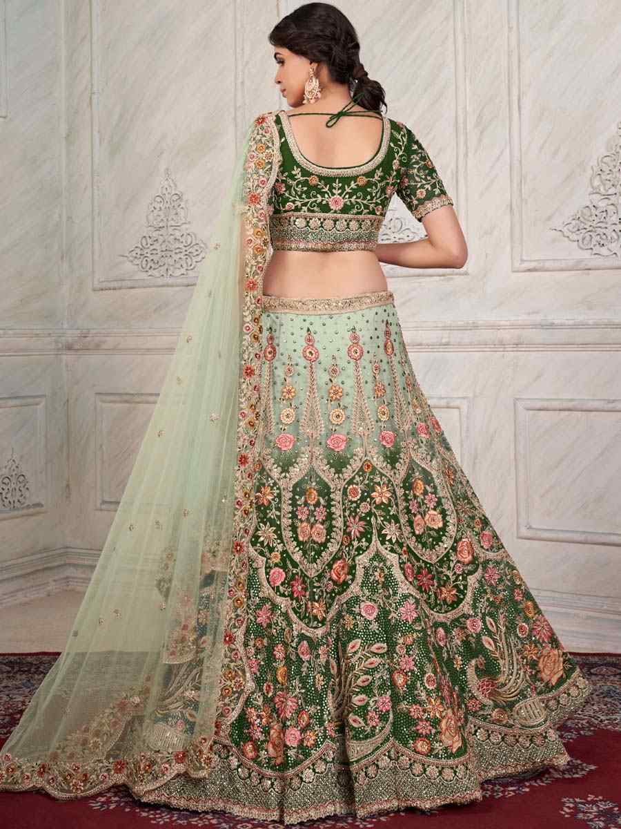 Green Soft Net Embroidered Bridal Reception Heavy Border Lehenga Choli