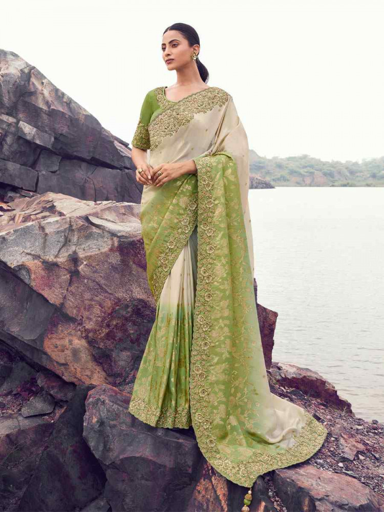 Image of Green Tissue Silk With Jacquard Embroidery Bridal Reception Festival Wedding Fancy Heavy Border Saree