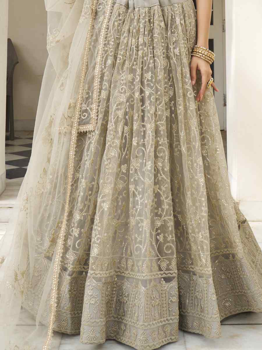 Ivory Net Embroidered Wedding Reception Festival Heavy Border Lehenga Choli