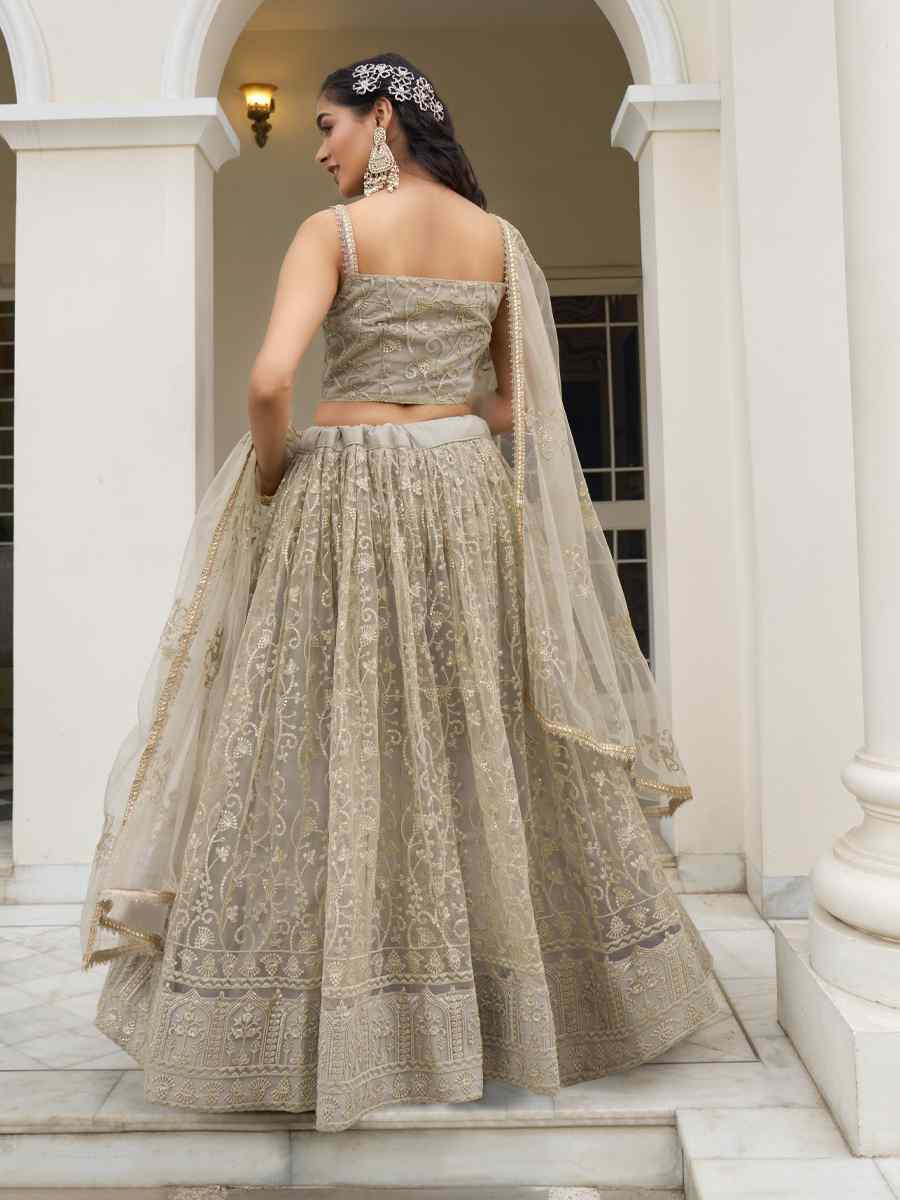 Ivory Net Embroidered Wedding Reception Festival Heavy Border Lehenga Choli