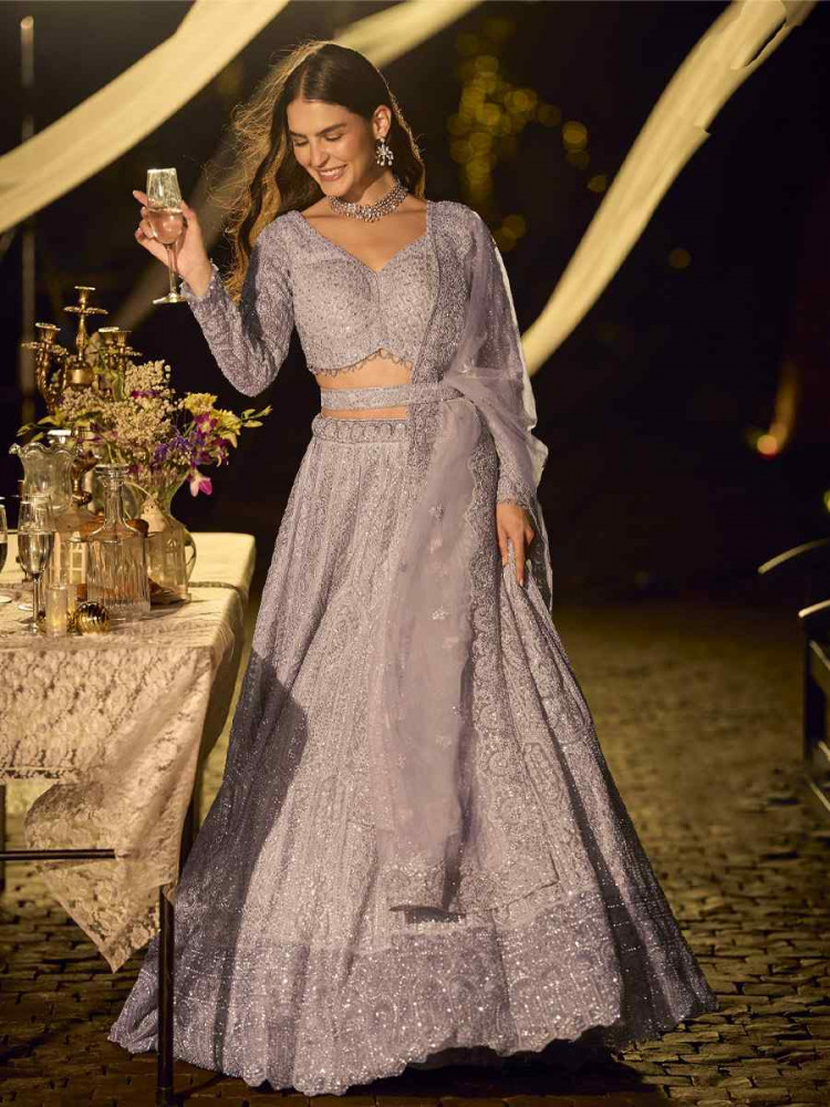 Image of Lavender Pure Net Embroidered Wedding Reception Festival Heavy Border Lehenga Choli
