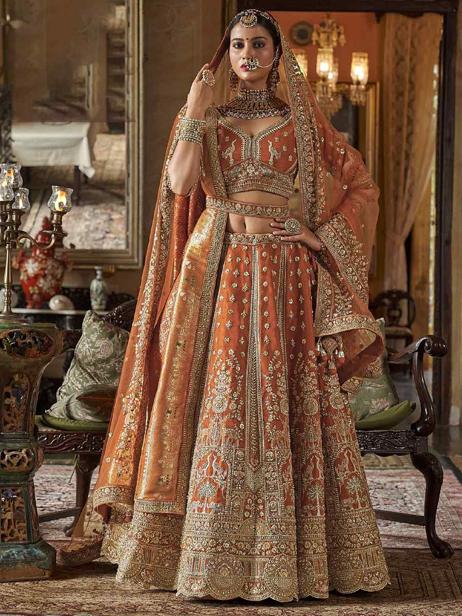Light Orange Silk Embroidered Bridal Wedding Reception Festival Heavy Border Lehenga Choli