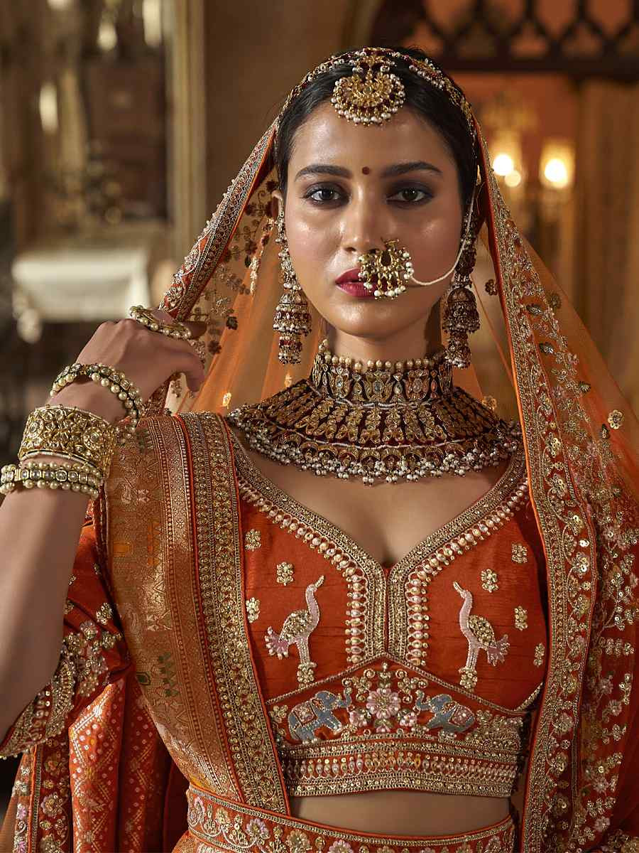 Light Orange Silk Embroidered Bridal Wedding Reception Festival Heavy Border Lehenga Choli