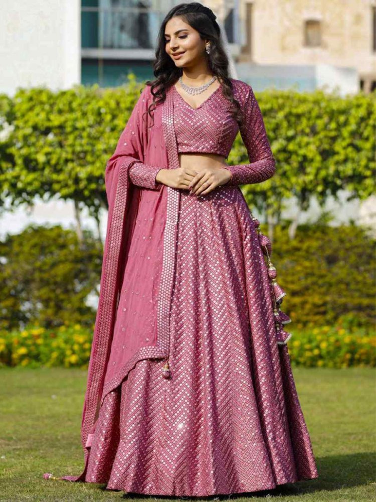 Magenta Faux Georgette Embroidery Reception Party Wear Heavy Border Lehenga Choli