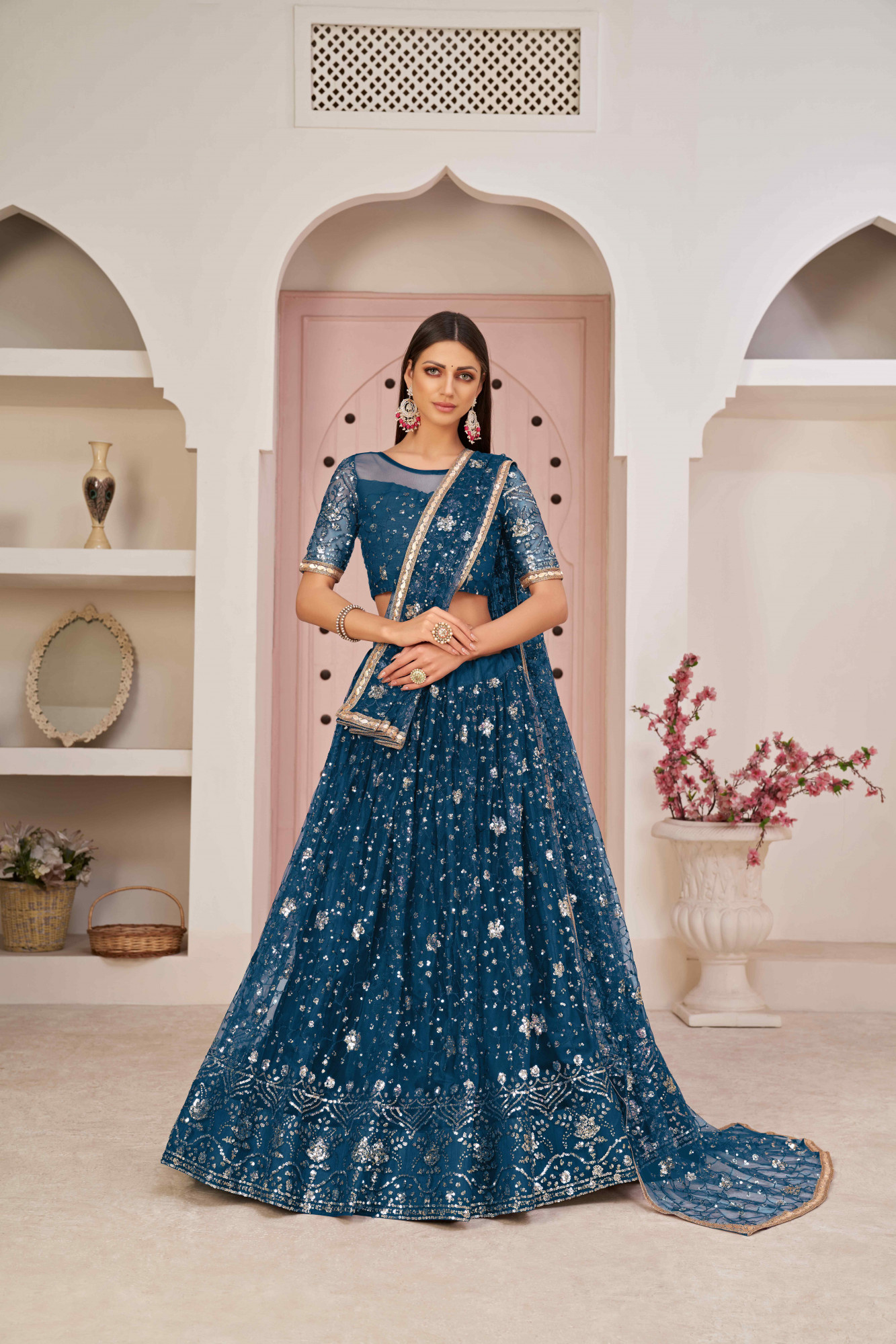 More Peach Net Embroidered Wedding Reception Festival Heavy Border Lehenga Choli
