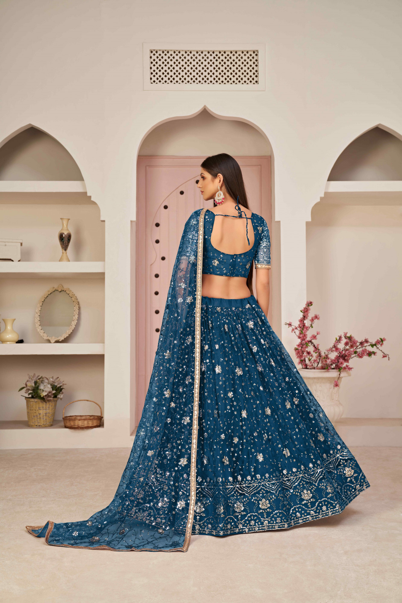 More Peach Net Embroidered Wedding Reception Festival Heavy Border Lehenga Choli
