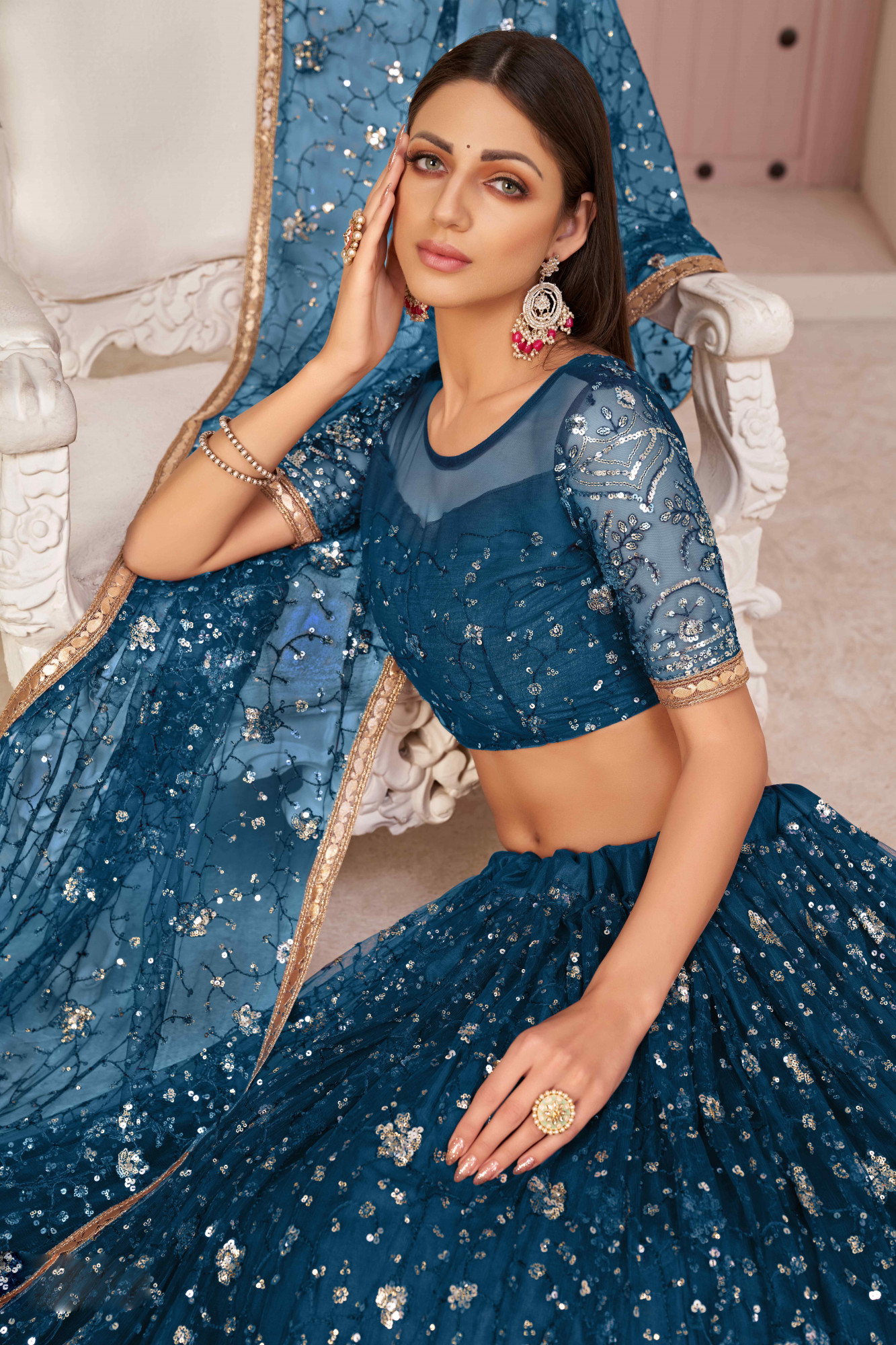 More Peach Net Embroidered Wedding Reception Festival Heavy Border Lehenga Choli