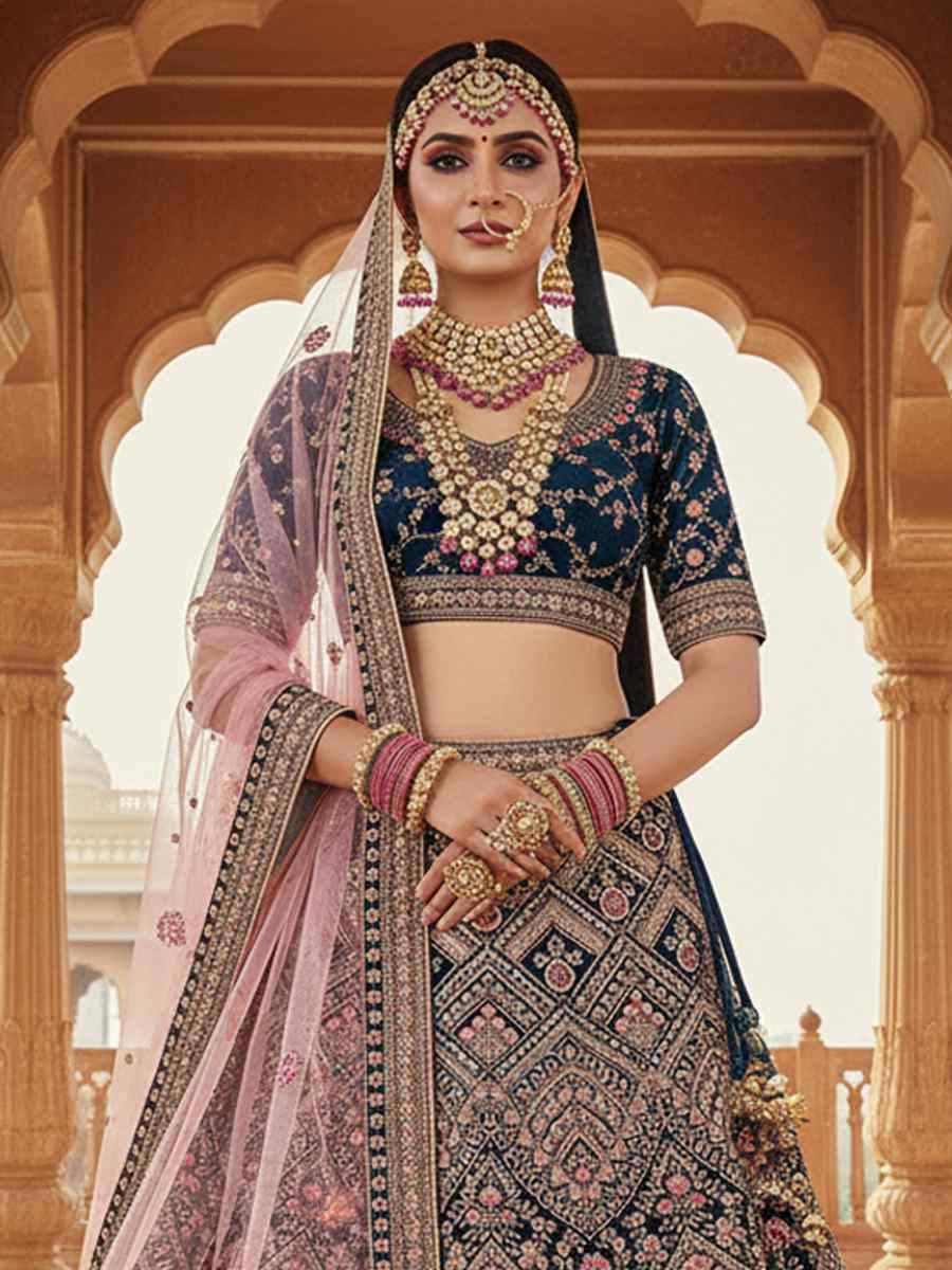 More Peach Velvet Embroidered Wedding Reception Festival Heavy Border Lehenga Choli