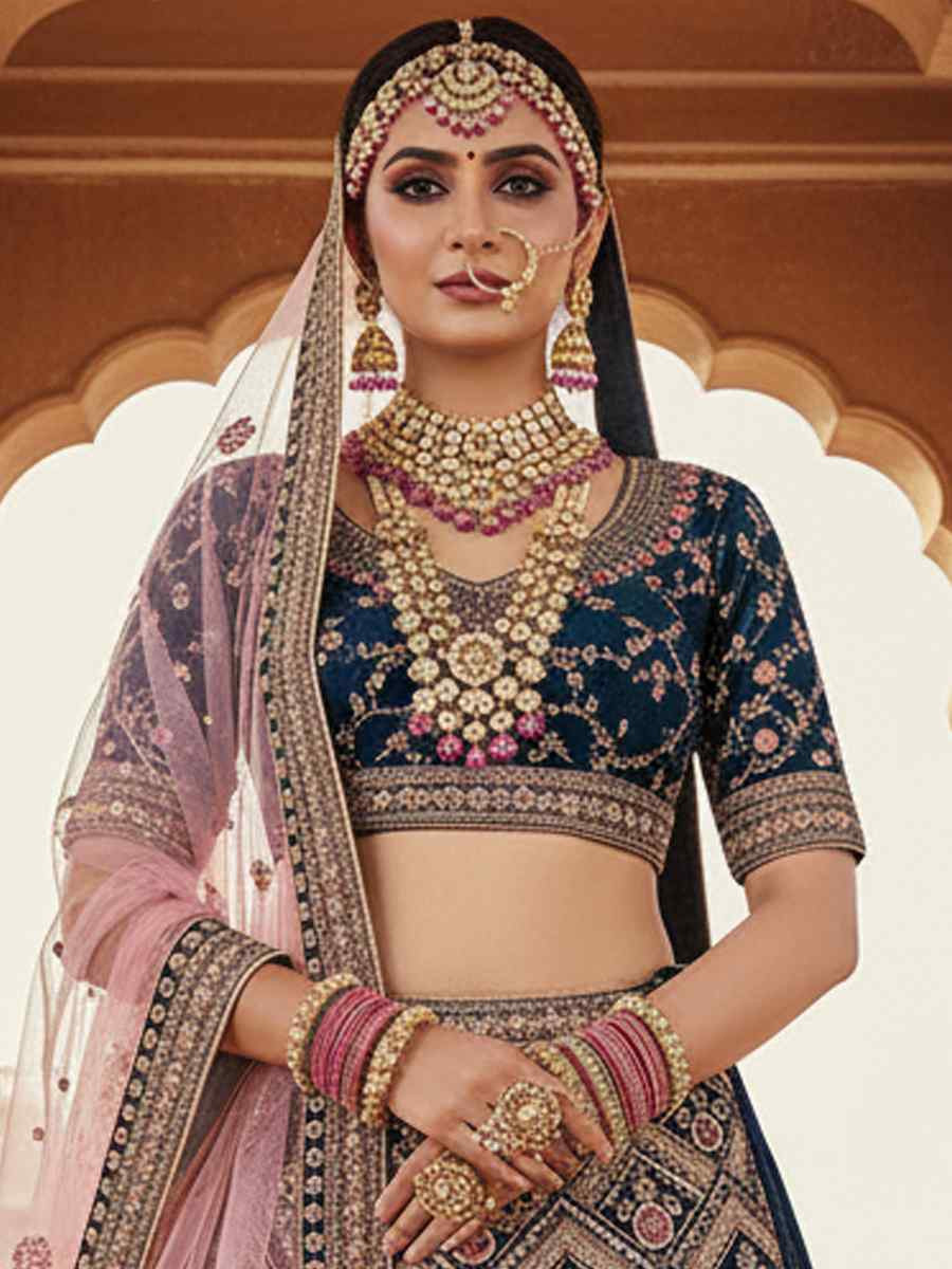 More Peach Velvet Embroidered Wedding Reception Festival Heavy Border Lehenga Choli