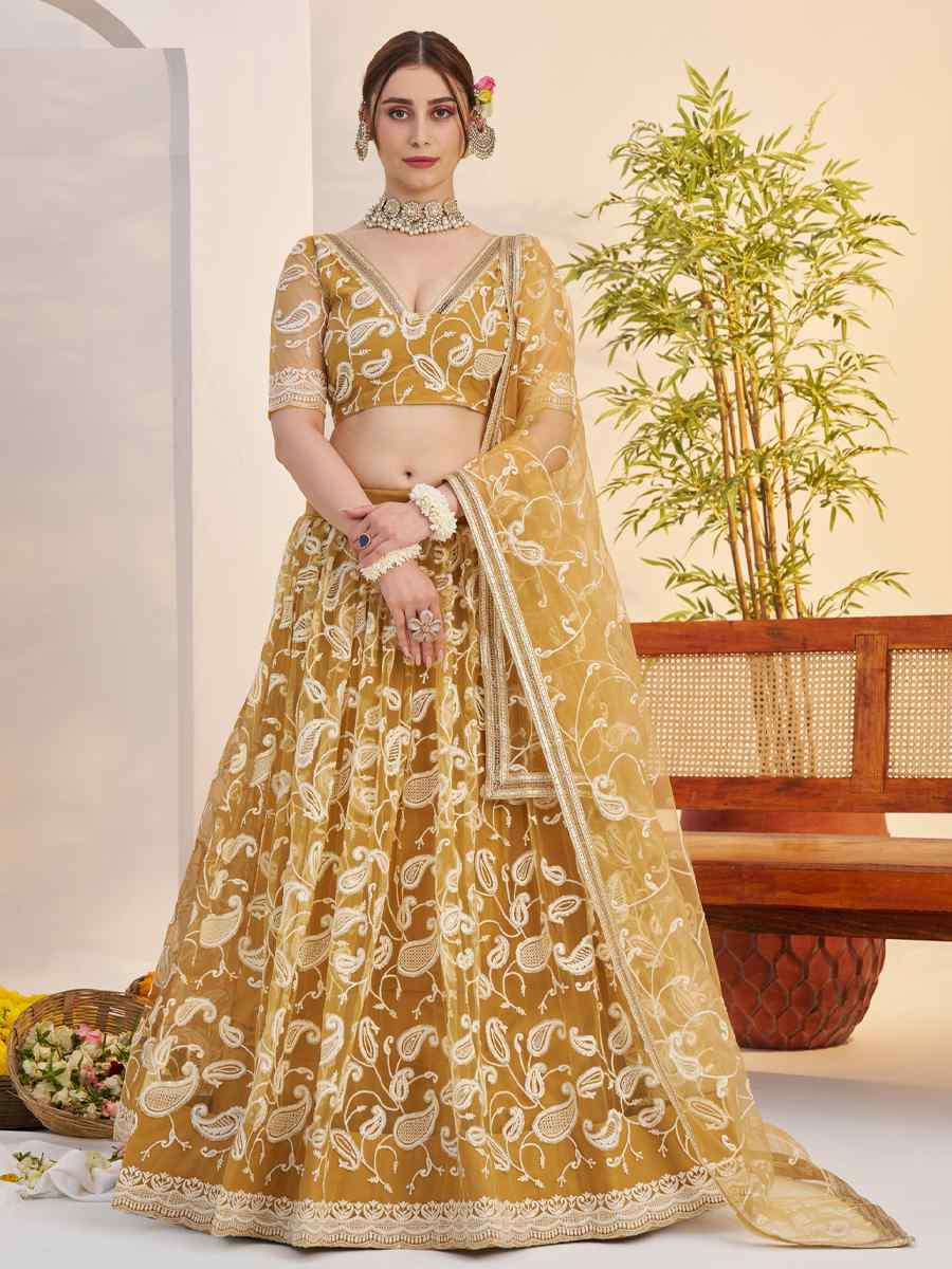 Mustard Butterfly Net Embroidered Bridal Wedding Reception Festival Heavy Border Lehenga Choli