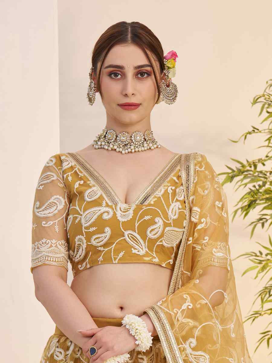 Mustard Butterfly Net Embroidered Bridal Wedding Reception Festival Heavy Border Lehenga Choli
