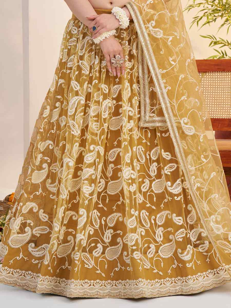 Mustard Butterfly Net Embroidered Bridal Wedding Reception Festival Heavy Border Lehenga Choli
