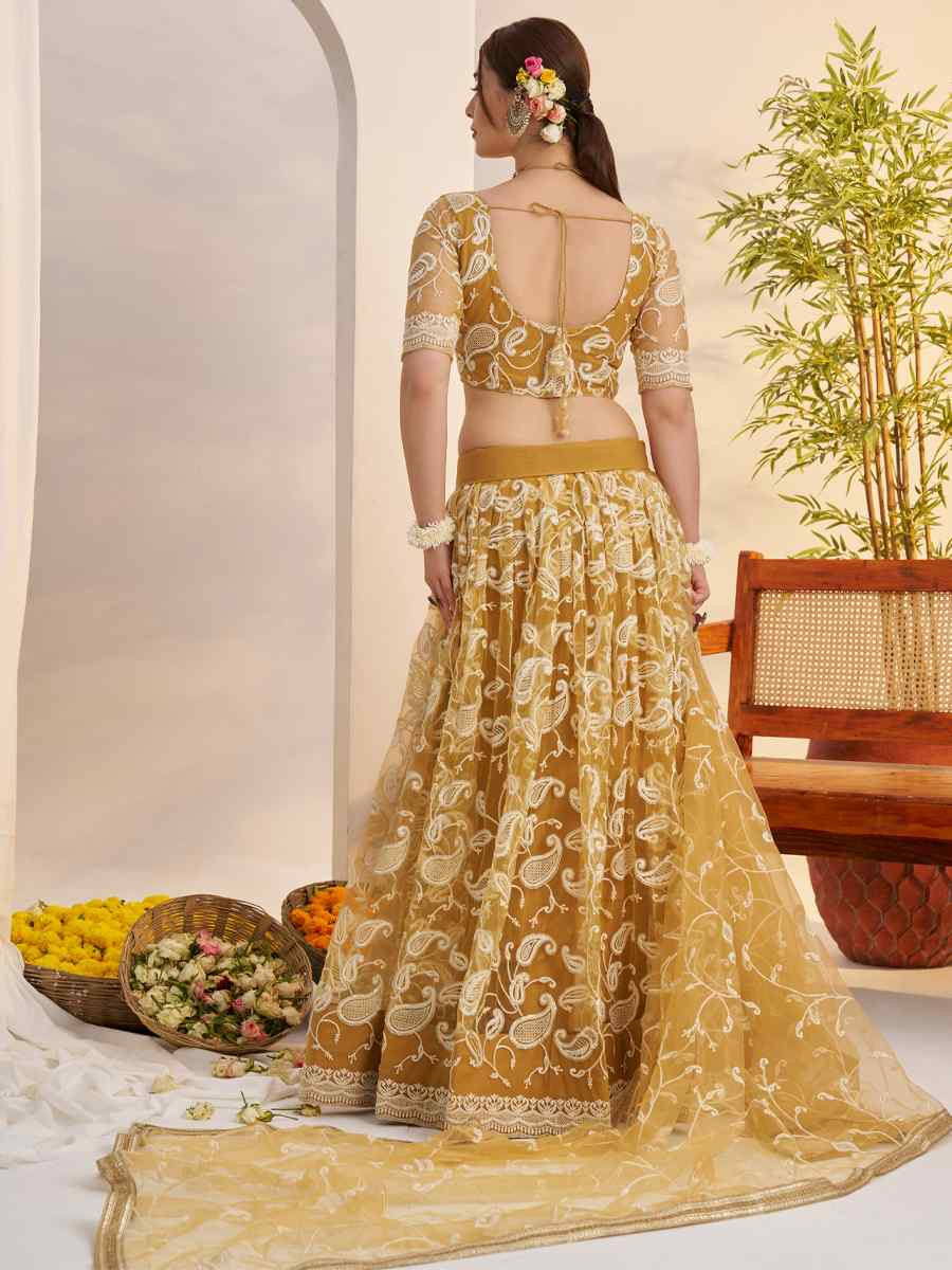 Mustard Butterfly Net Embroidered Bridal Wedding Reception Festival Heavy Border Lehenga Choli