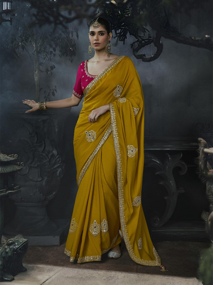 Image of Mustard Tissue Silk Embroidery Stone Work Sequins Wedding Reception Party Festival Casual Heavy Border Sarees