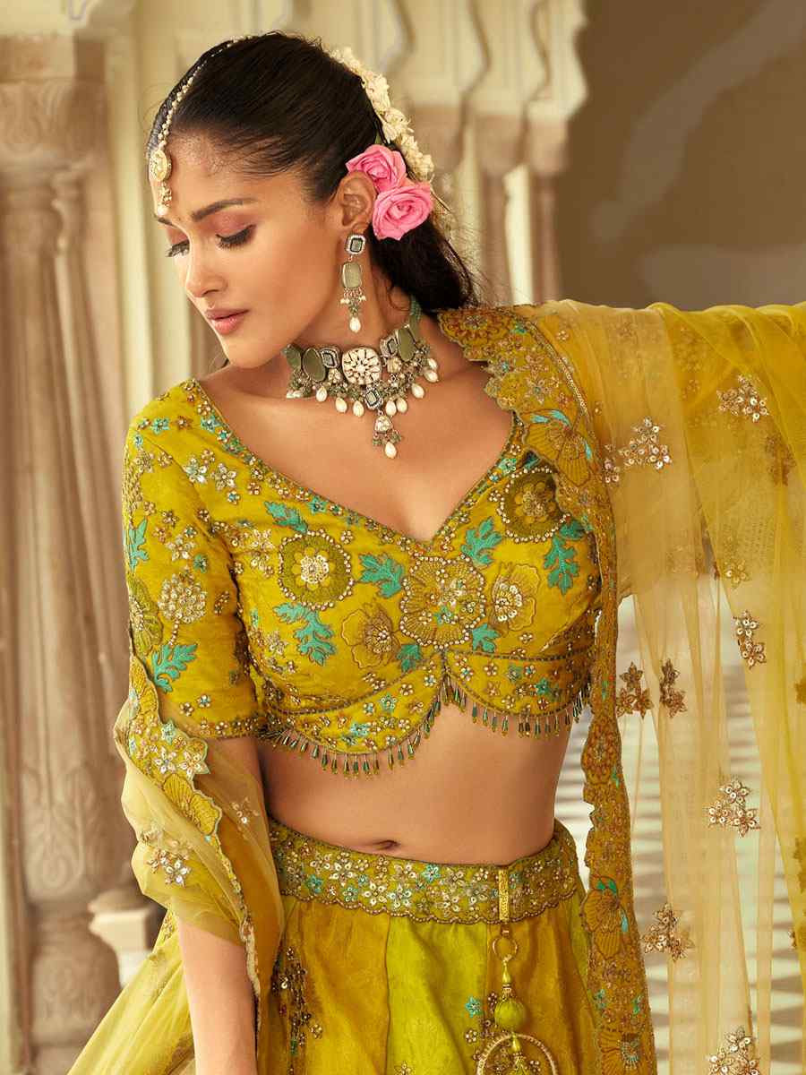 Mustared And Green Heavy Pure Silk Embroidered Wedding Reception Festival Heavy Border Lehenga Choli
