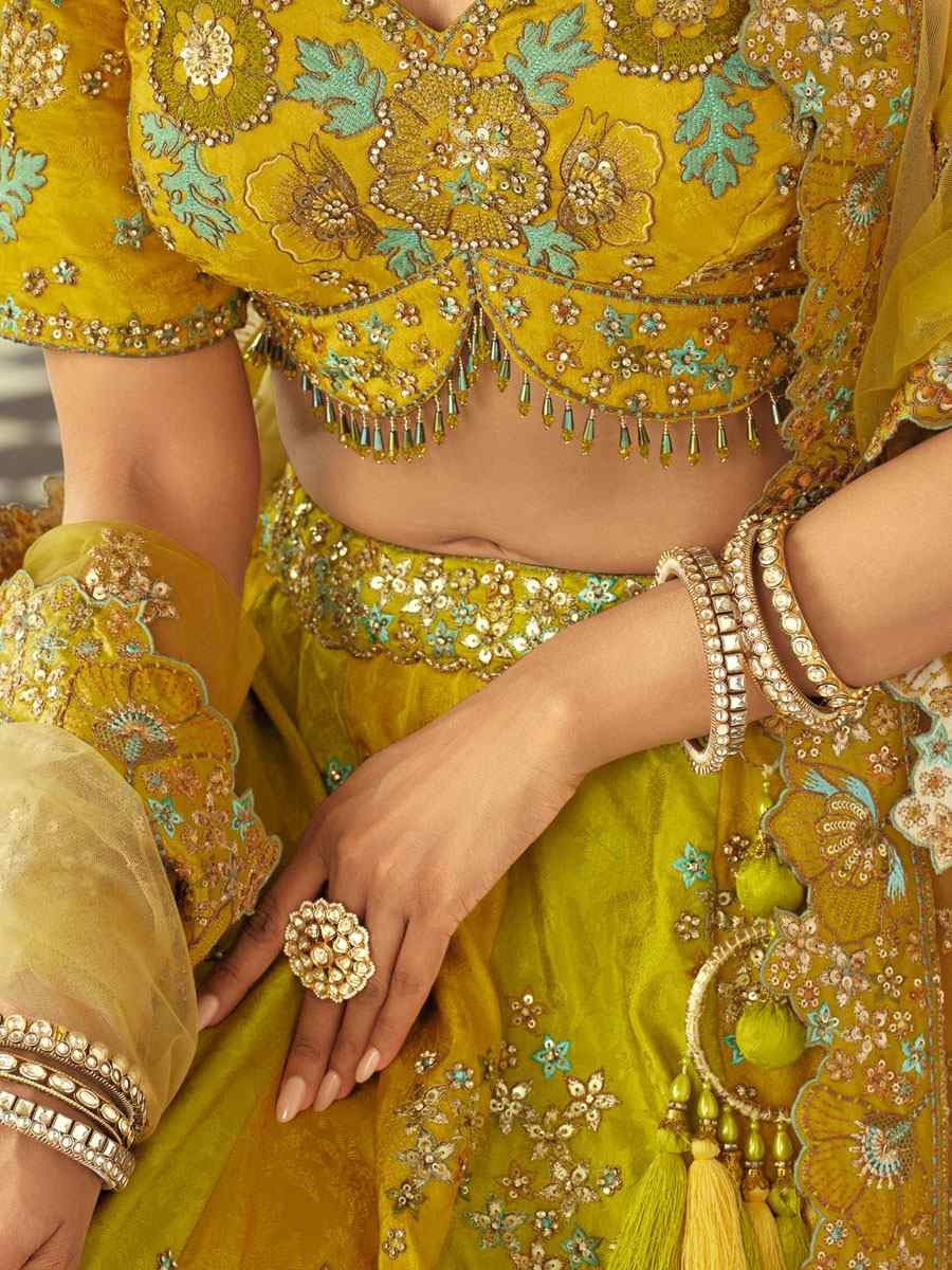 Mustared And Green Heavy Pure Silk Embroidered Wedding Reception Festival Heavy Border Lehenga Choli