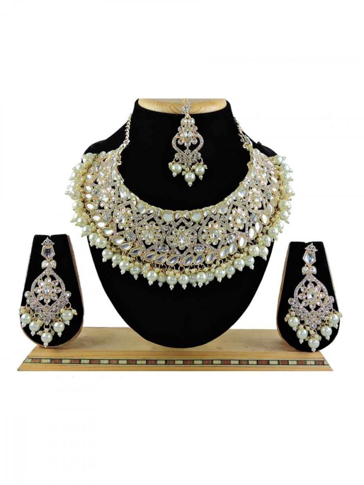 Off White Alloy Festival Wear Kundan Necklace