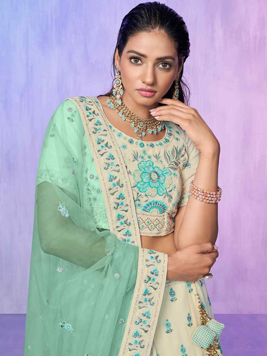Off White Georgette Embroidered Bridal Reception Heavy Border Lehenga Choli