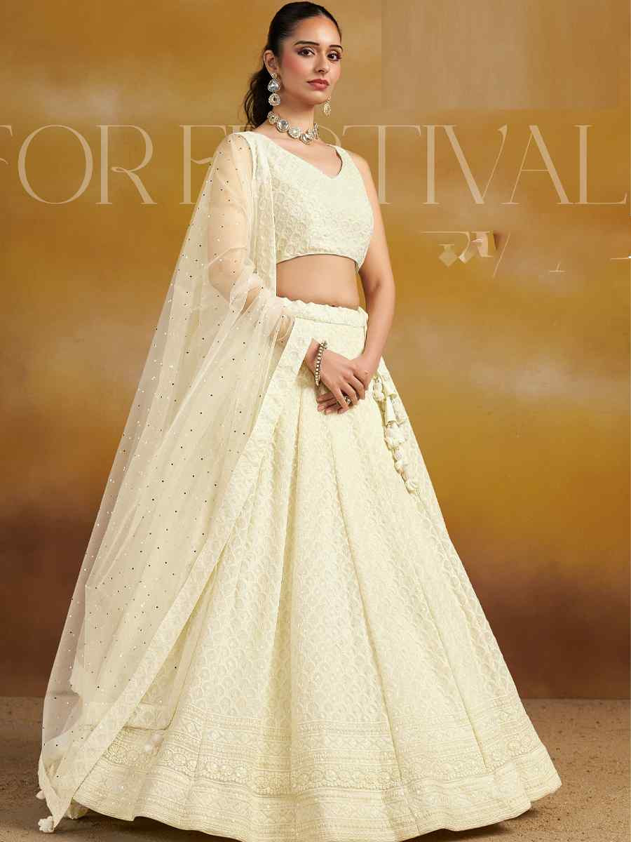 Off-White Georgette Embroidered Reception Wedding Heavy Border Lehenga Choli