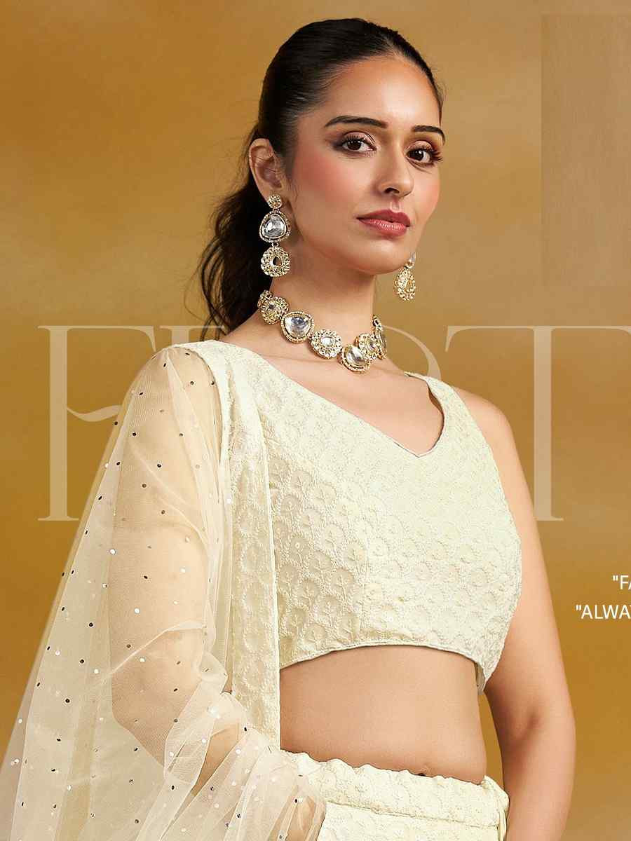 Off-White Georgette Embroidered Reception Wedding Heavy Border Lehenga Choli
